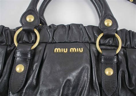 miu miu shoulder strap bag|Black Leather Top.